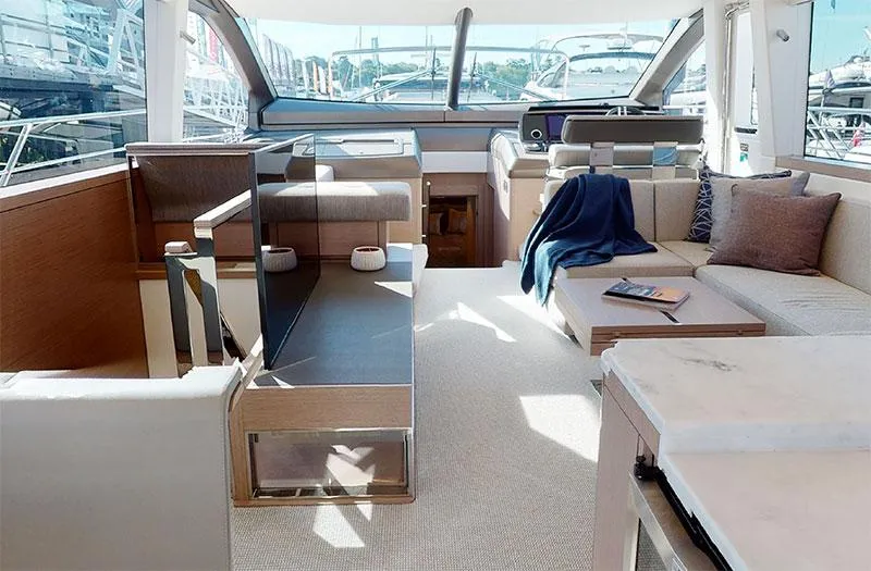  Yacht Photos Pics Luxurious interior of 2022 Sunseeker Manhattan 68 yacht with modern furnishings.