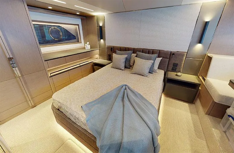  Yacht Photos Pics Luxurious bedroom interior of 2022 Sunseeker Manhattan 68 yacht with modern design.