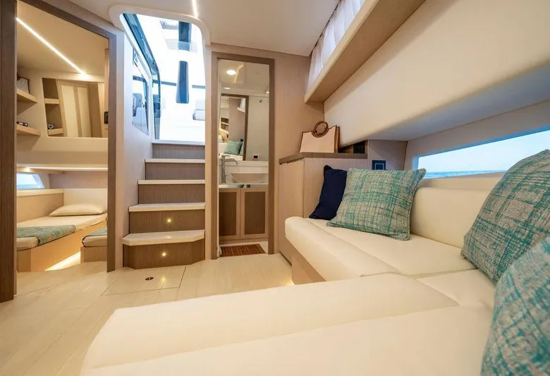  Yacht Photos Pics Luxurious interior of 2025 Apreamare Gozzo 45 yacht with modern seating and elegant design.