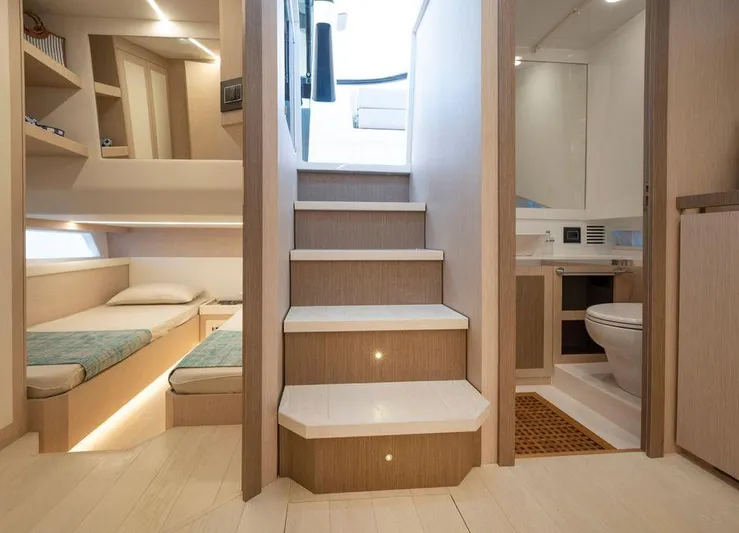  Yacht Photos Pics Interior of 2025 Apreamare Gozzo 45 yacht, featuring cozy cabin and modern bathroom.