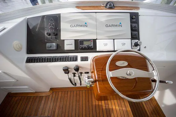 Reel Gratitude Yacht Photos Pics Helm of 2014 Release Boatworks 46 Custom Express Carolina with Garmin navigation system.
