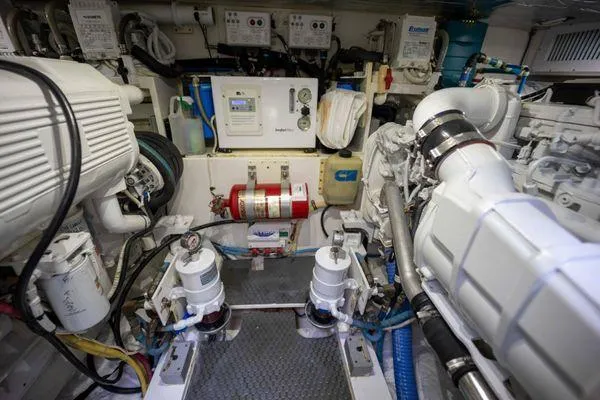 Reel Gratitude Yacht Photos Pics Engine room of 2014 Release Boatworks 46 Custom Express Carolina, showcasing machinery and equipment.