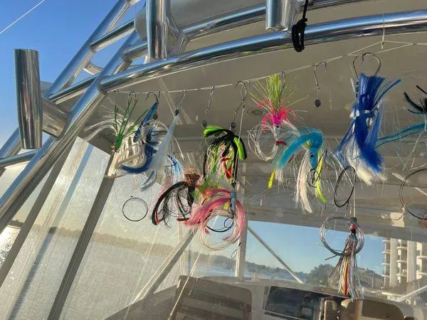 Reel Gratitude Yacht Photos Pics Colorful fishing lures hanging on a 2014 Release Boatworks 46 Custom Express Carolina.