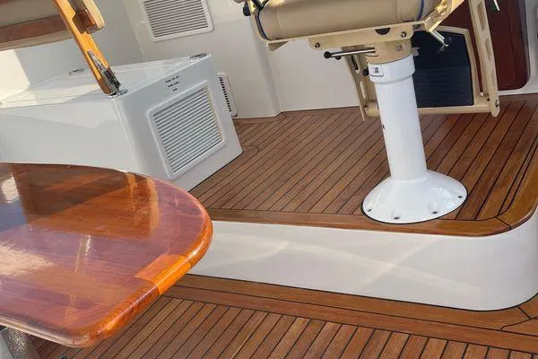 Reel Gratitude Yacht Photos Pics 2014 Release Boatworks 46 Custom Express Carolina interior with teak flooring and seating.