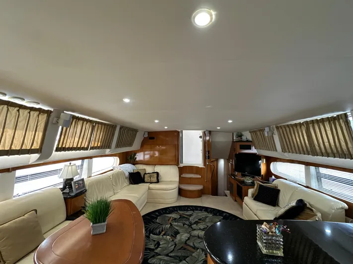  Yacht Photos Pics Luxurious interior of 2002 Carver 466 Motor Yacht with elegant seating and decor.