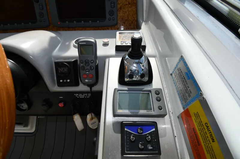  Yacht Photos Pics Control panel of a 2007 Formula 45 Yacht with navigation and joystick controls.