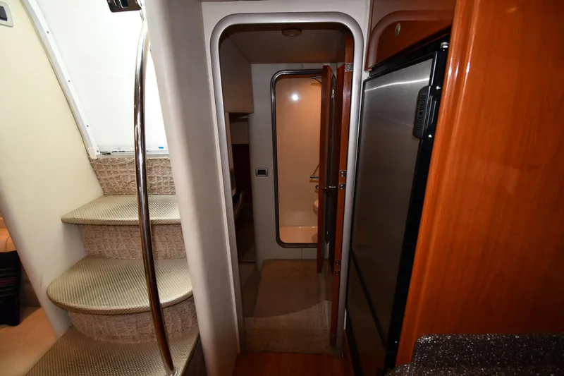  Yacht Photos Pics Interior view of 2007 Formula 45 Yacht, featuring stairs and a compact hallway.