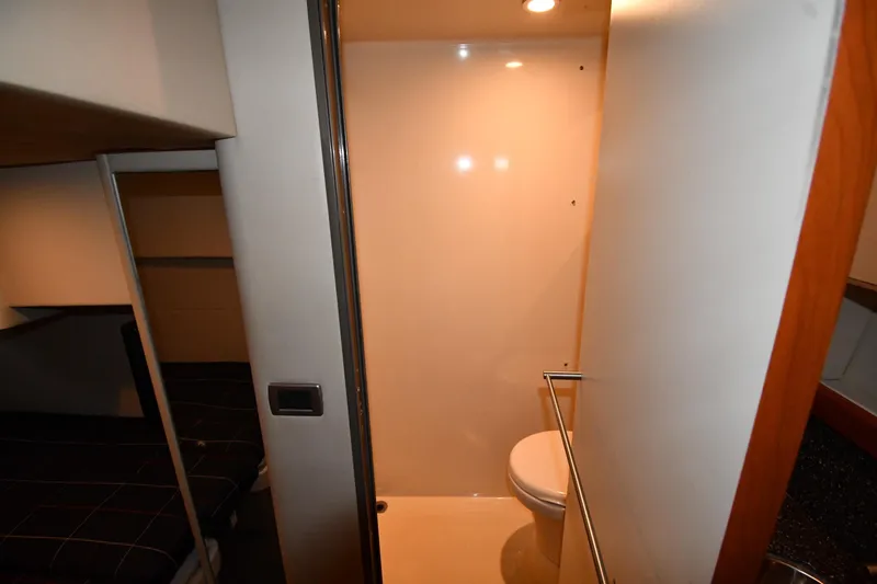  Yacht Photos Pics 2007 Formula 45 Yacht interior bathroom with modern design and compact layout.