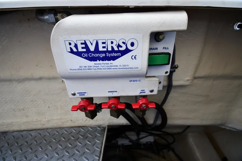  Yacht Photos Pics Reverso oil change system on 2007 Formula 45 Yacht, featuring drain and fill controls.