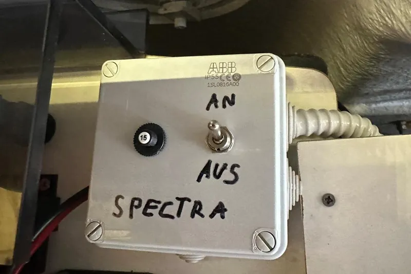  Yacht Photos Pics Control box with switch labeled "AN AUS SPECTRA" on Beneteau Gran Turismo 44, 2012 model.