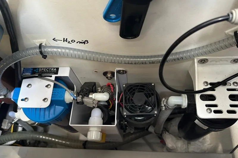  Yacht Photos Pics Engine room of 2012 Beneteau Gran Turismo 44 with watermaker system components.