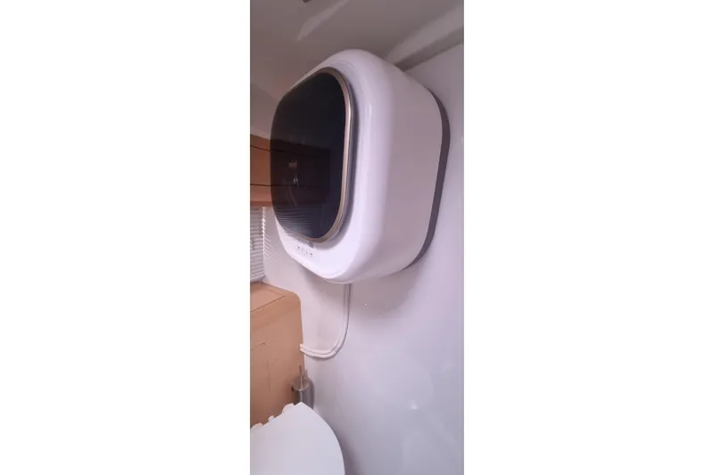  Yacht Photos Pics Wall-mounted appliance inside 2012 Beneteau Gran Turismo 44 yacht interior.