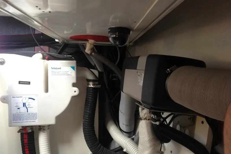  Yacht Photos Pics Engine room of 2012 Beneteau Gran Turismo 44 with water separator and ventilation system.