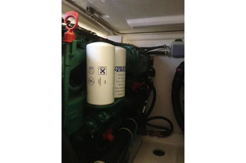  Yacht Photos Pics Engine compartment of 2012 Beneteau Gran Turismo 44 with visible oil filter.