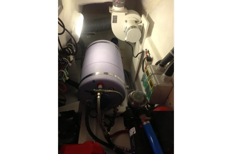  Yacht Photos Pics Engine room of 2012 Beneteau Gran Turismo 44 with mechanical components and wiring.