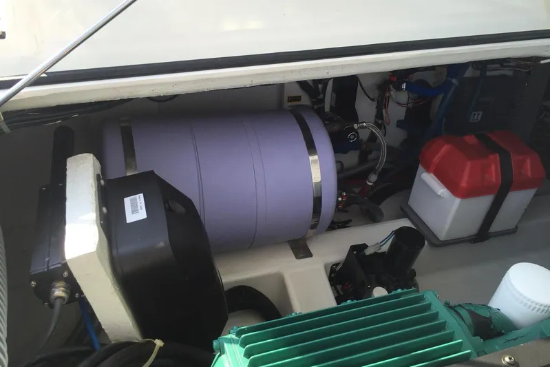  Yacht Photos Pics Engine compartment of a 2012 Beneteau Gran Turismo 44, featuring mechanical components and wiring.