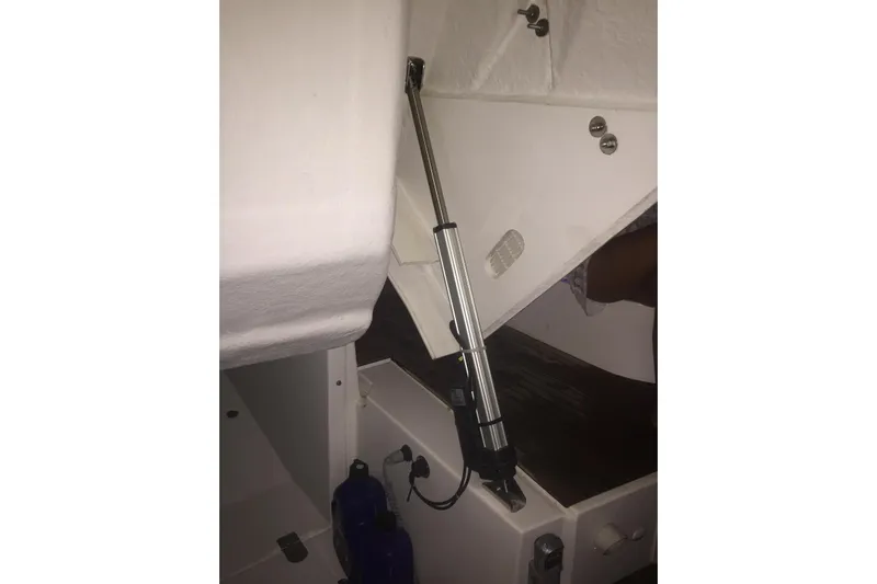  Yacht Photos Pics Interior view of 2012 Beneteau Gran Turismo 44 boat, featuring a hydraulic lift mechanism.