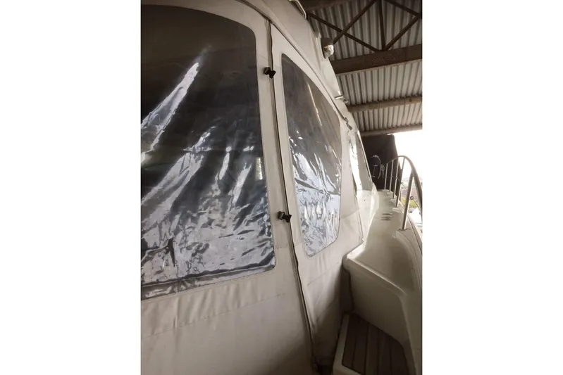  Yacht Photos Pics 2012 Beneteau Gran Turismo 44 yacht with covered deck in storage.