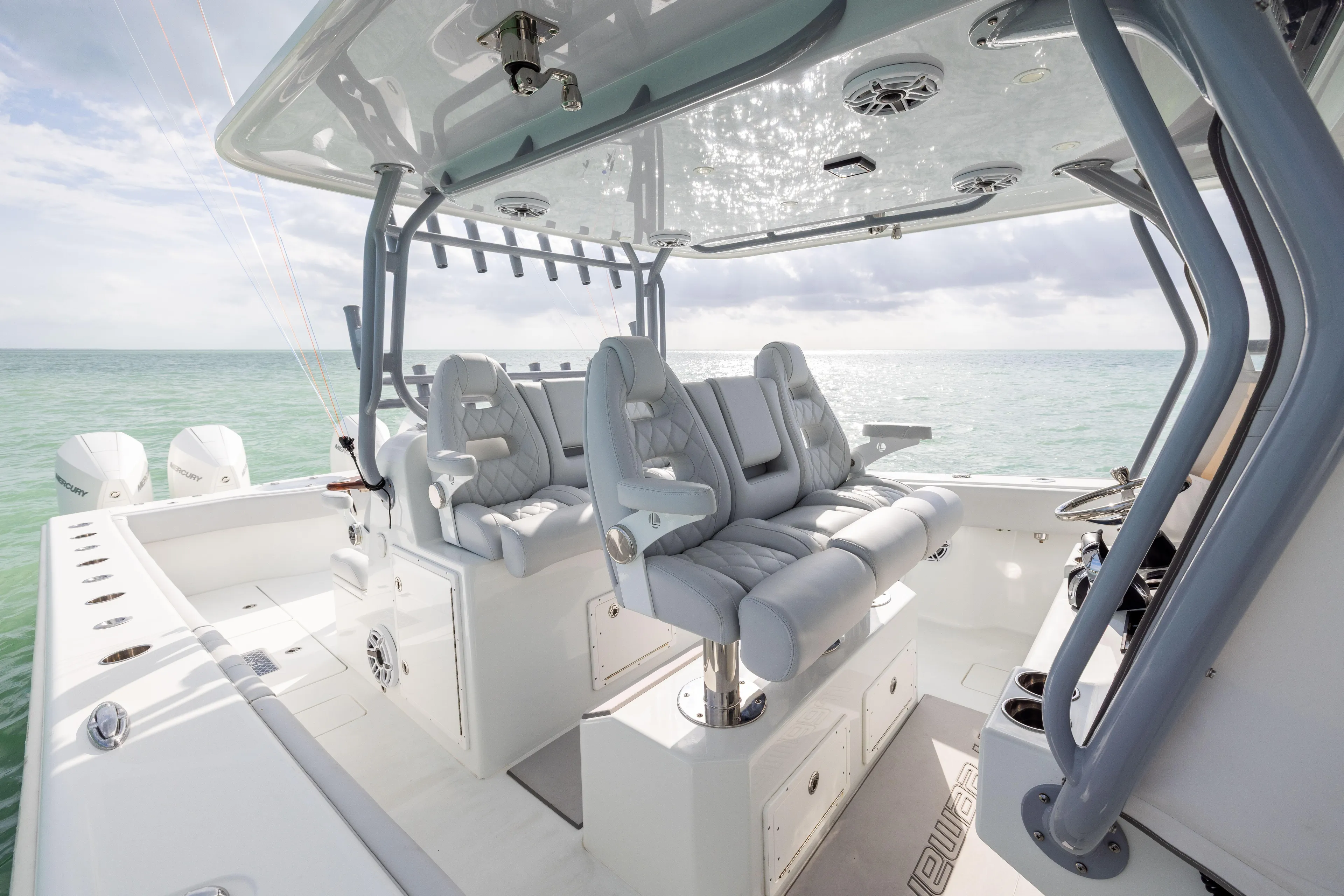  Yacht Photos Pics Luxurious 2022 Freeman 42LR boat interior with plush seating and ocean view.
