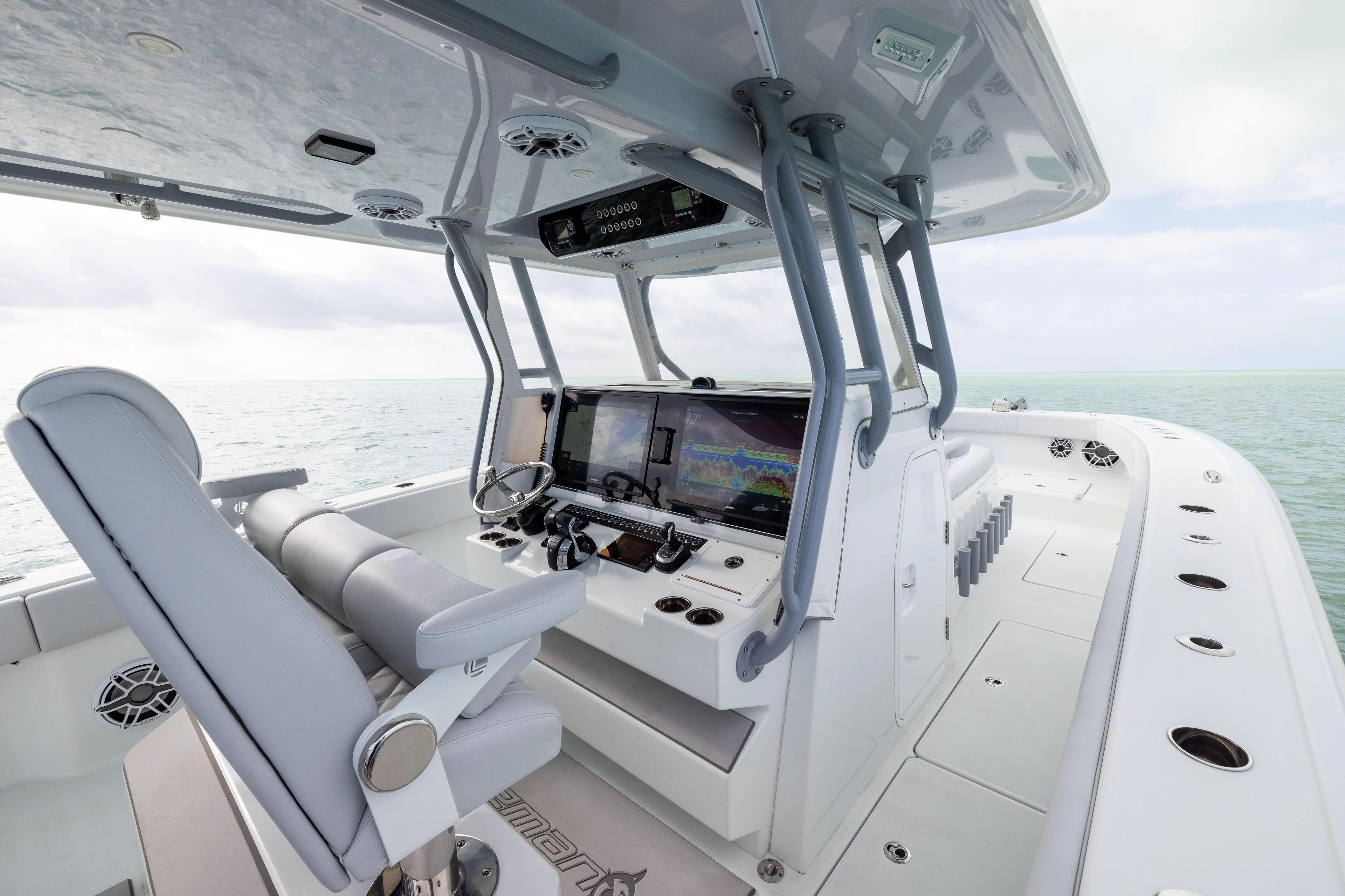  Yacht Photos Pics 2022 Freeman 42LR boat interior with advanced navigation system and luxurious seating.