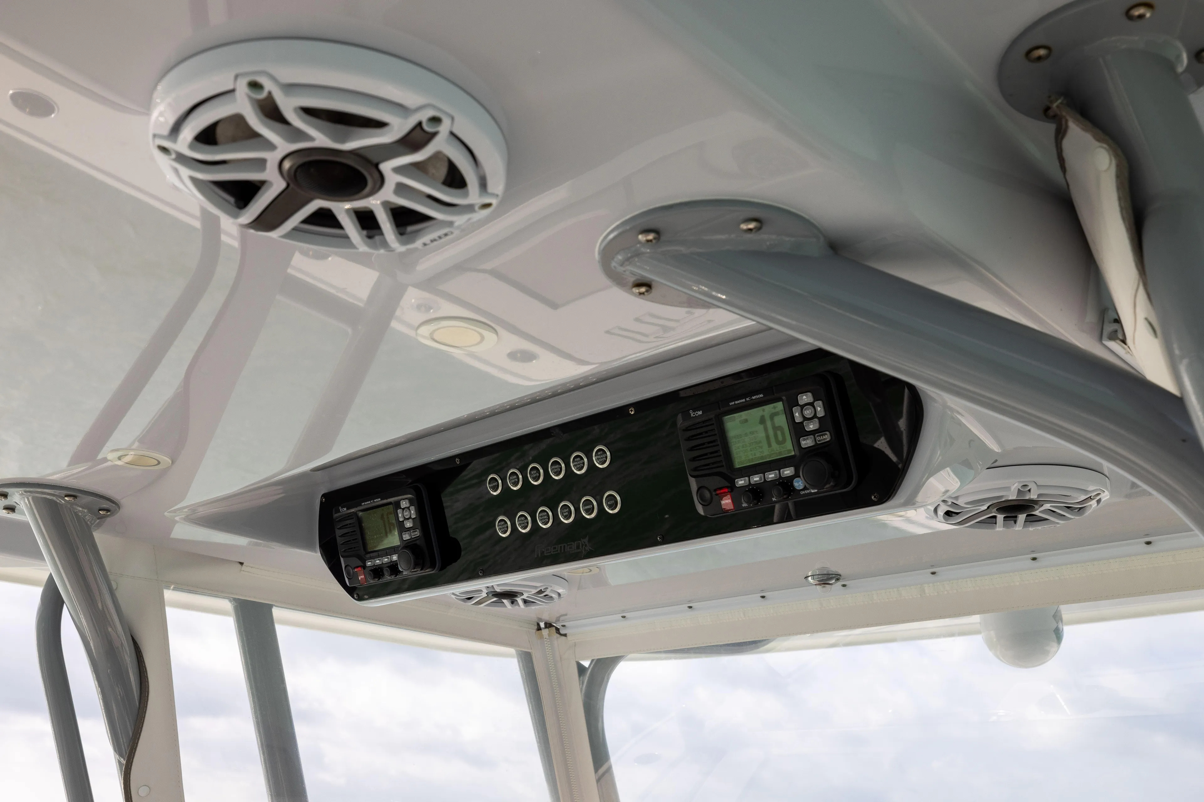  Yacht Photos Pics 2022 Freeman 42LR boat console with speakers and electronic controls.