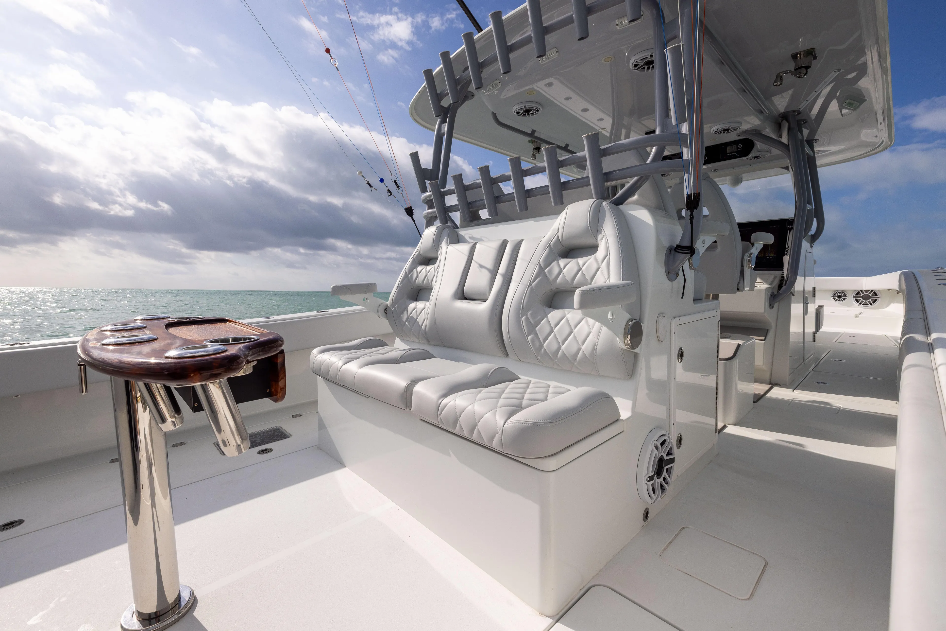  Yacht Photos Pics Luxurious 2022 Freeman 42LR boat interior with plush seating and ocean view.