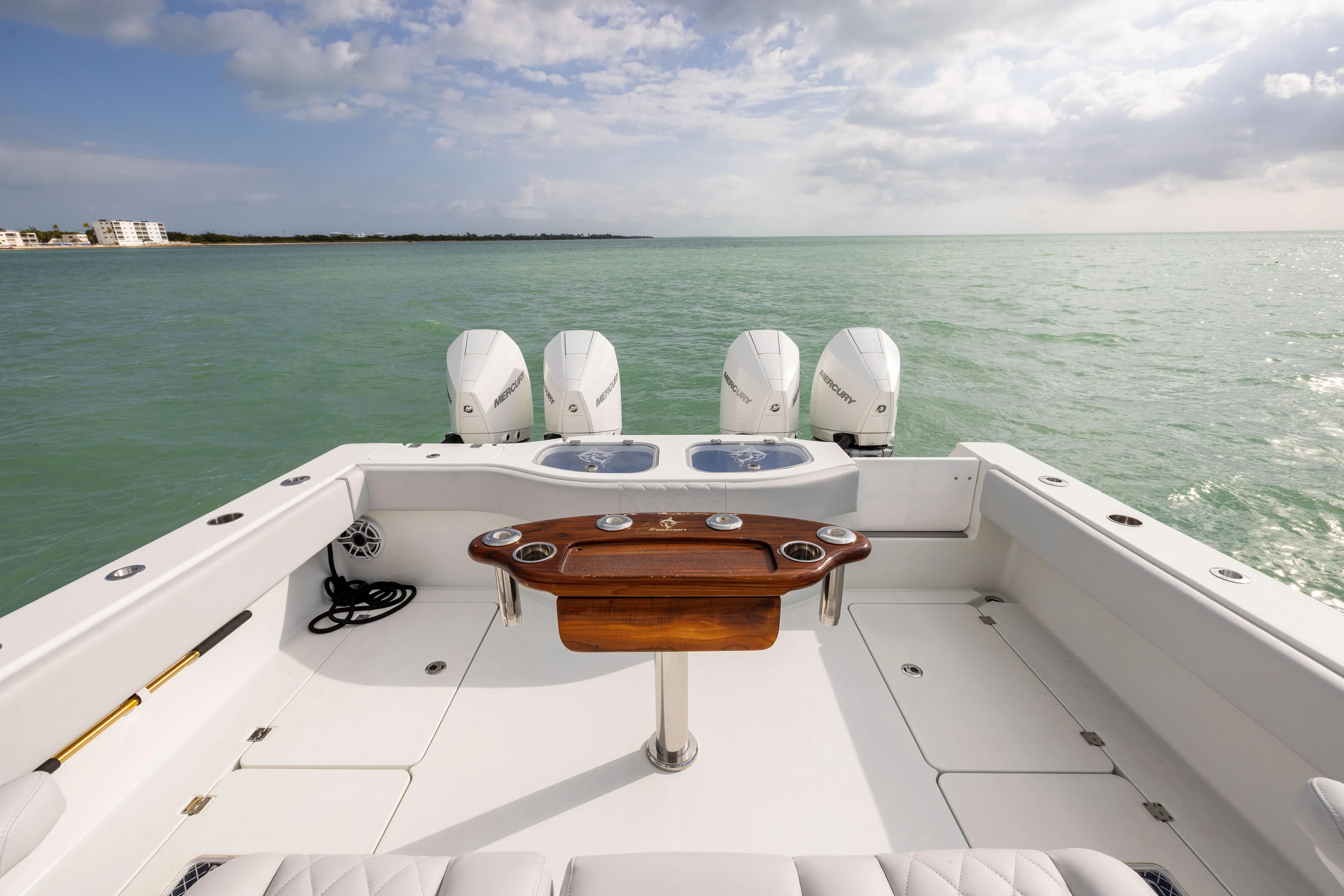  Yacht Photos Pics Freeman 42LR 2022 boat deck with four engines, ocean view, and fishing station.