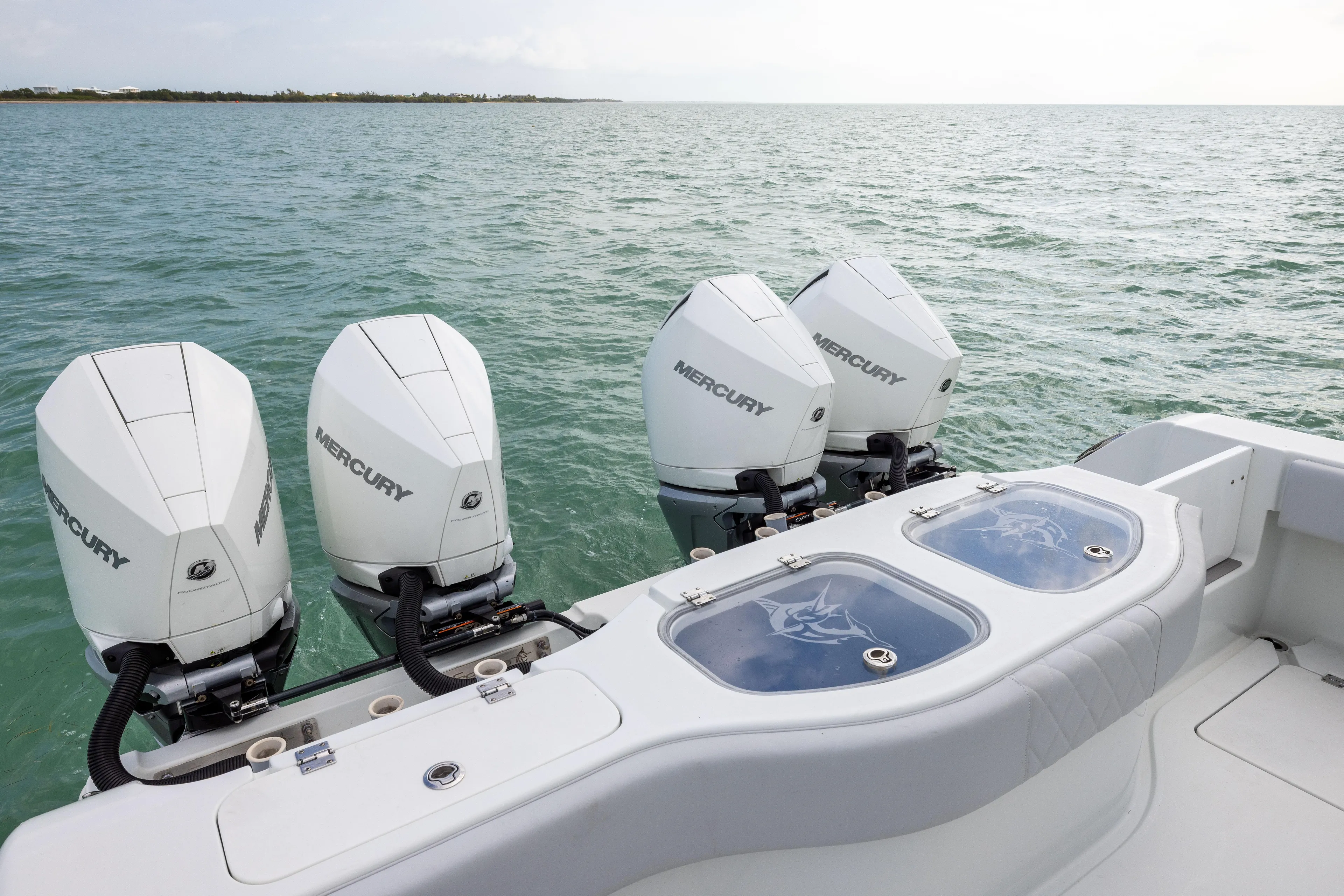  Yacht Photos Pics Freeman 42LR 2022 boat with four Mercury outboard engines on open water.