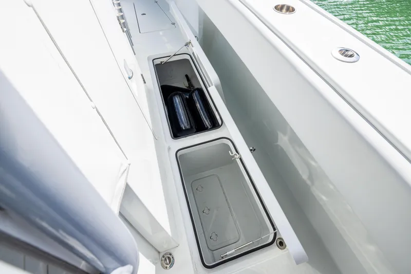  Yacht Photos Pics Storage compartments on a 2022 Freeman 42LR boat, featuring sleek design and functionality.