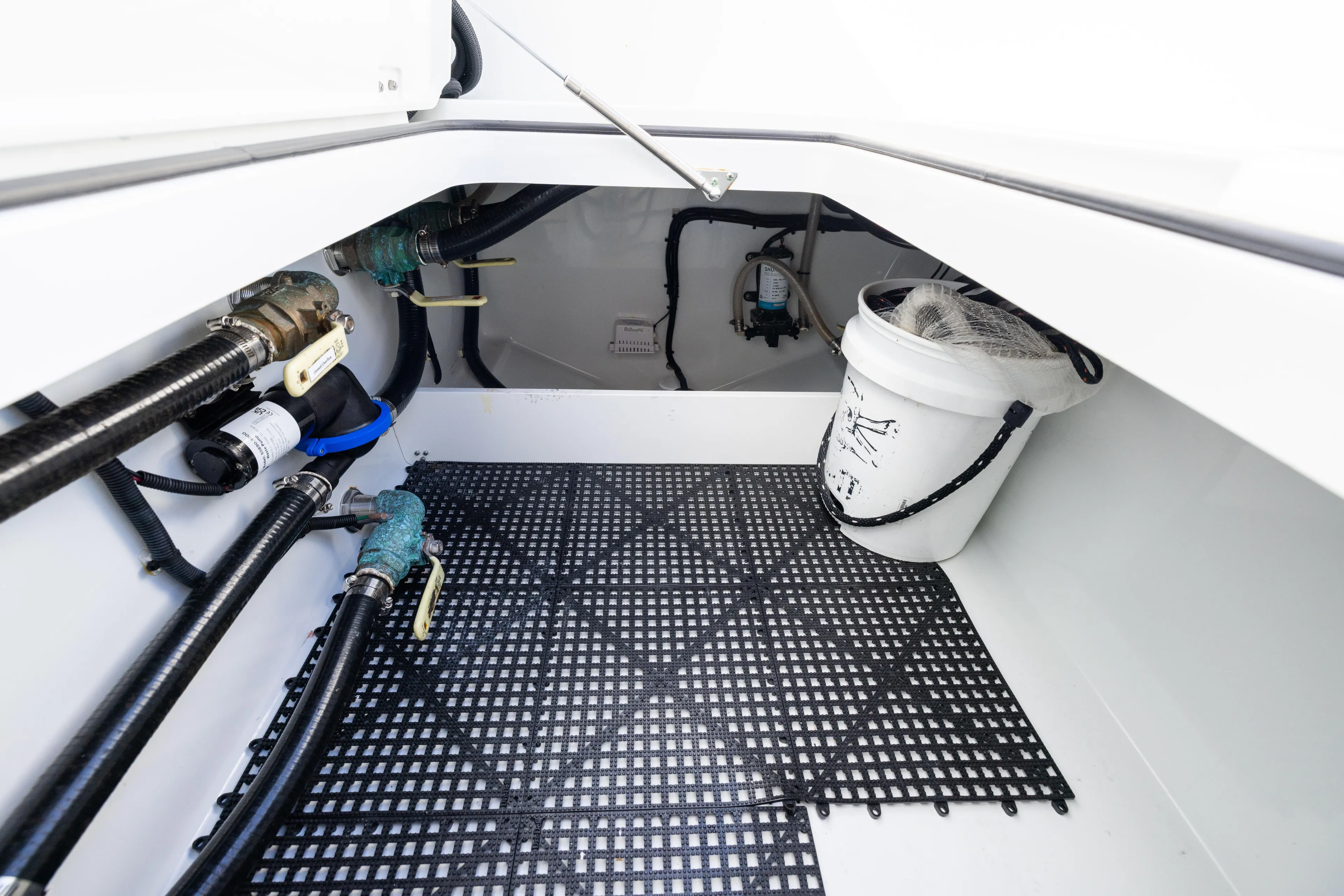  Yacht Photos Pics Freeman 42LR 2022 boat interior with plumbing and storage bucket.