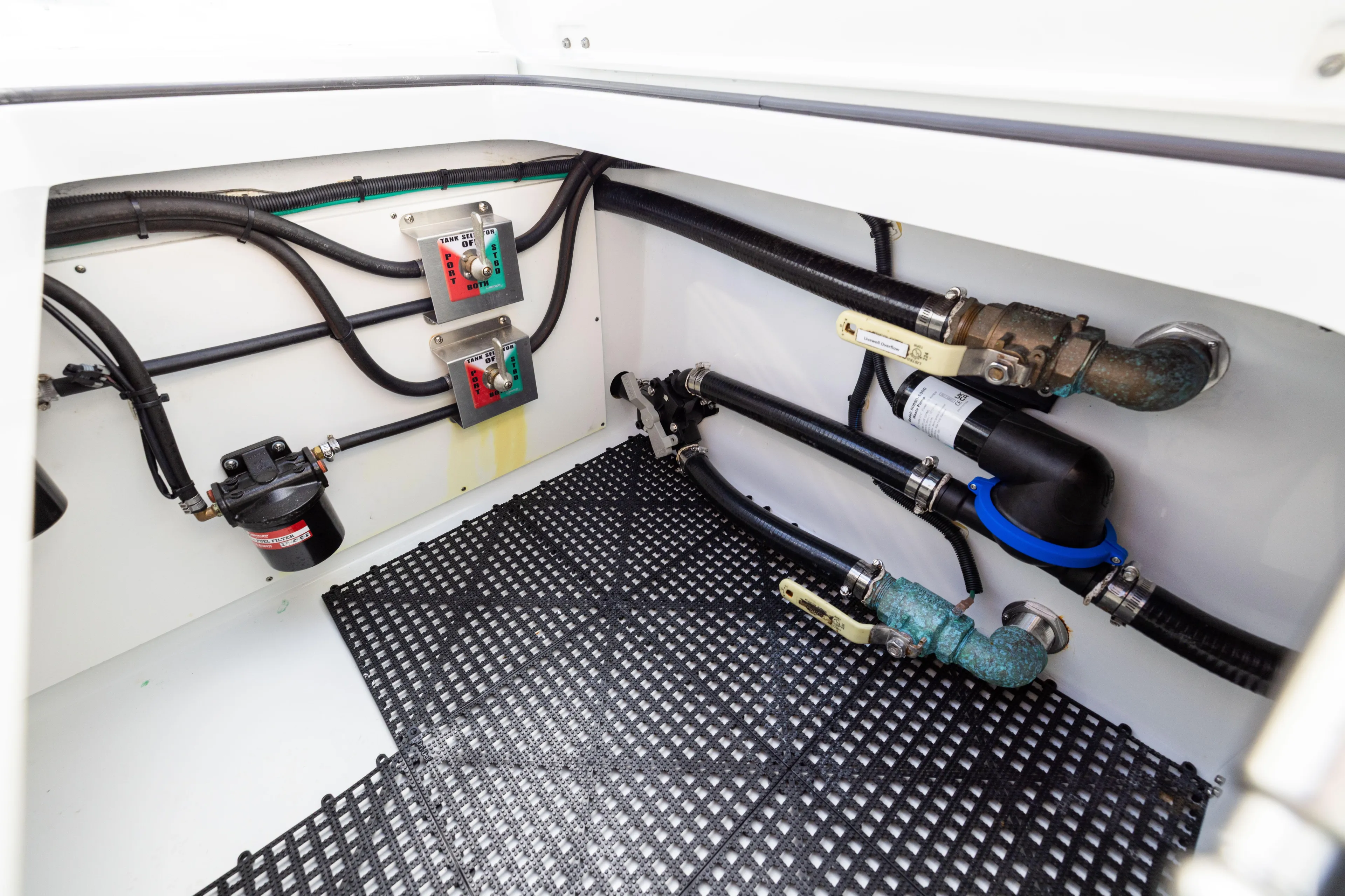  Yacht Photos Pics Freeman 42LR 2022 boat plumbing system with valves and hoses in engine compartment.