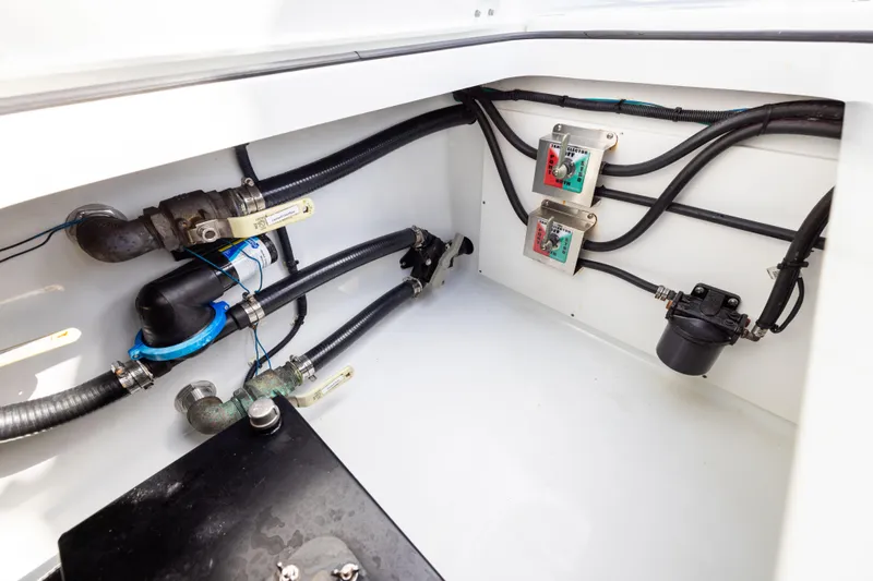  Yacht Photos Pics Interior view of 2022 Freeman 42LR boat showing plumbing and electrical components.