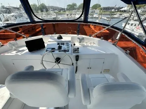 Brass Ring Yacht Photos Pics 2009 Marine Trader 36 Euro Sedan helm with dual seats and navigation equipment.