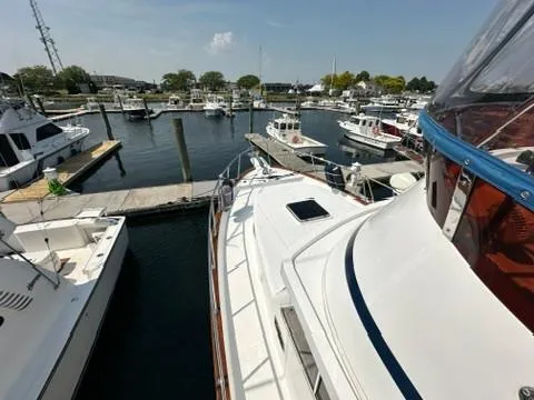 Brass Ring Yacht Photos Pics 2009 Marine Trader 36 Euro Sedan docked in a busy marina.