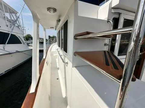 Brass Ring Yacht Photos Pics 2009 Marine Trader 36 Euro Sedan yacht, side view with wooden railings and steps.