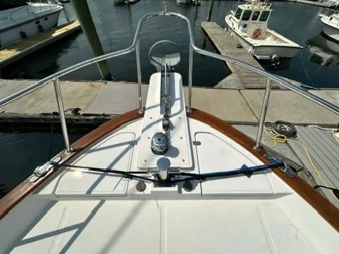 Brass Ring Yacht Photos Pics 2009 Marine Trader 36 Euro Sedan yacht bow at marina dock.