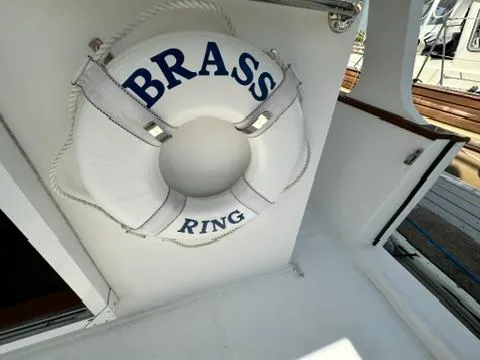Brass Ring Yacht Photos Pics Life preserver labeled "Brass Ring" on 2009 Marine Trader 36 Euro Sedan boat.