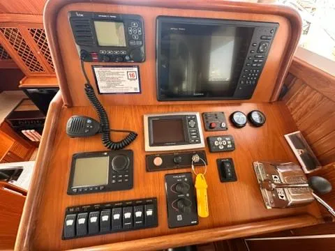 Brass Ring Yacht Photos Pics Control panel of 2009 Marine Trader 36 Euro Sedan with navigation and communication equipment.
