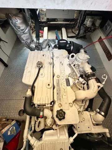 Brass Ring Yacht Photos Pics Engine room of a 2009 Marine Trader 36 Euro Sedan boat, showcasing mechanical components.