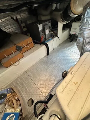 Brass Ring Yacht Photos Pics Engine room of 2009 Marine Trader 36 Euro Sedan with equipment and storage.