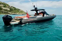 2023 SACS Strider 15 FB luxury boat on turquoise water, coastal background.
