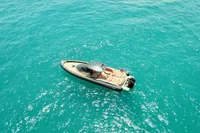 2023 SACS Strider 15 FB boat on clear turquoise water, aerial view.