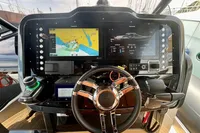 Cockpit of 2023 SACS Strider 15 FB with advanced navigation and control systems.