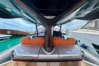 2023 SACS Strider 15 FB luxury yacht interior with sleek design and orange seating.