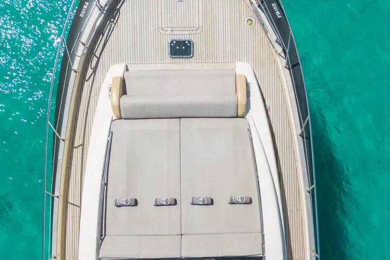 Vintage Yacht Photos Pics Aerial view of 2006 Guy Couach 2100 yacht deck on turquoise water.