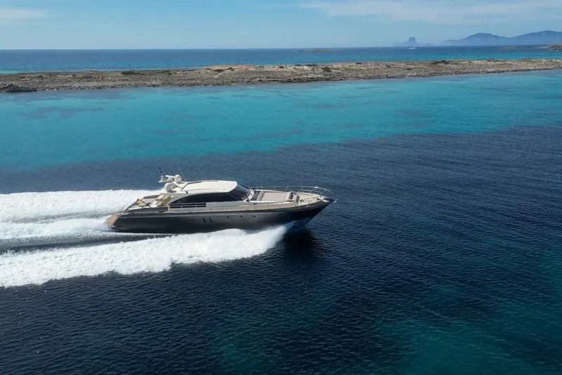 Vintage Yacht Photos Pics Luxury yacht Guy Couach 2100 cruising in clear blue waters, 2006 model.