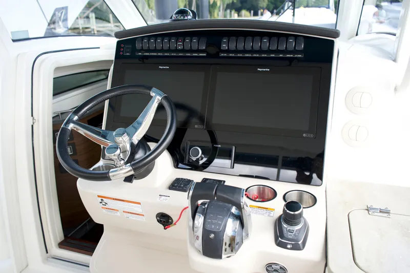 Yacht Kings Yacht Photos Pics 2020 Boston Whaler 350 Realm helm with dual displays and modern controls.