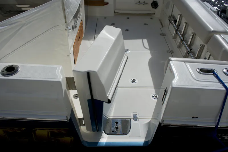 Yacht Kings Yacht Photos Pics 2020 Boston Whaler 350 Realm boat deck with seating and storage compartments.