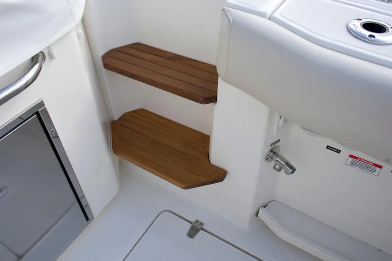 Yacht Kings Yacht Photos Pics Wooden steps on a 2020 Boston Whaler 350 Realm boat interior.
