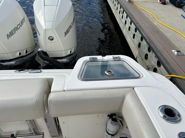 Yacht Kings Yacht Photos Pics Boston Whaler 350 Realm 2020 boat with twin Mercury engines at dock.